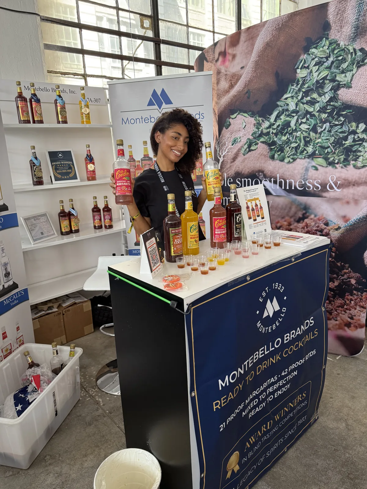 The booth from the aisle, with the ready-to-drink cocktails table